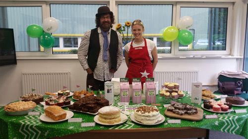 Kev Burrows and Lucy Forrester at Epwin Window Systems’ charity coffee morning for Macmillan Cancer Support