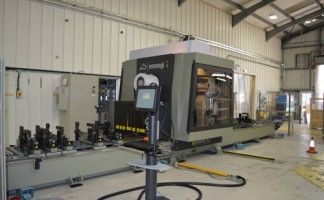 The Emmegi Satellite XT five axis machine being delivered at Alitex 6