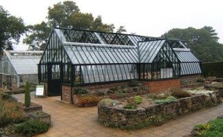 The Alpine House aluminium greenhouse at RHS Wisley manufactured by Alitex