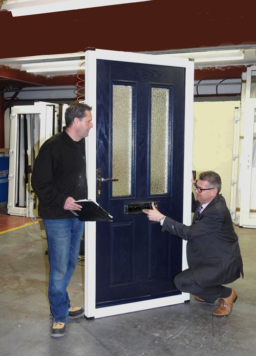 Paul Briggs (R), MD of Watergate Flood Solutions inspects one of the new composite flood defence doors alongside Martin Porter (L), head of production.