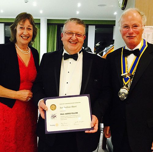 Paul Harris Fellowship recipient Ian Short (centre) with Scott Wolstenholme JP, president of The Rotary Club of Roundhay, and his wife Lynne.