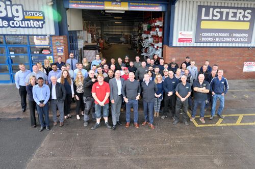 Phil Warren (centre left) Roy Frost (centre) and Darren Pusey (centre right) outside the factory with the Lister Trade Frames team