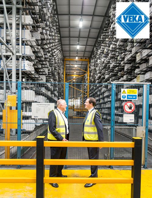VEKA Group MD David Jones (left) shows George Osborne the warehouse during the factory tour.