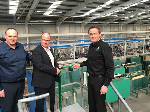 From left and right: Mark Herbert and Matt Prowse, joint managing directors of Mackenzie Glass, with Pilkington manager director, Matt Buckley