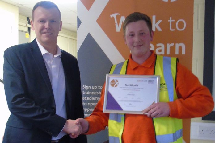 Mark Crane, commercial director at The Window Company (Contracts) pictured with a Basworx trainee at the end of the programme