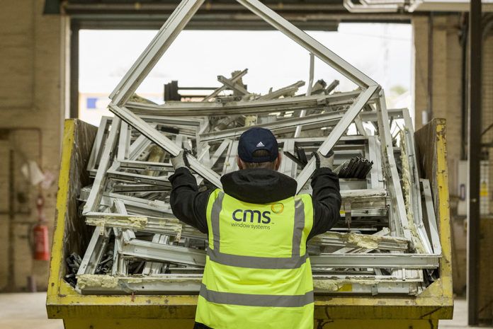 Inside the CMS recycling centre at Castlecary near Glasgow, where post-use windows and doors from CMS Trade customers are dismantled and separated to be sent for recycling rather than being consigned to landfill.