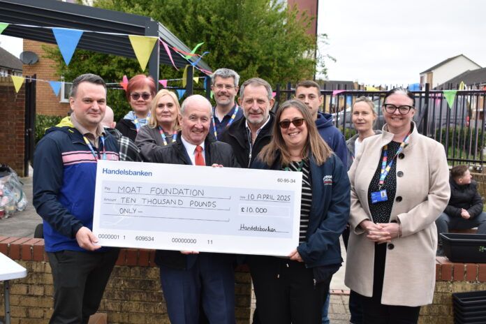 TWC358 The Window Company (Contracts) presenting a £10K cheque to Moat Foundation