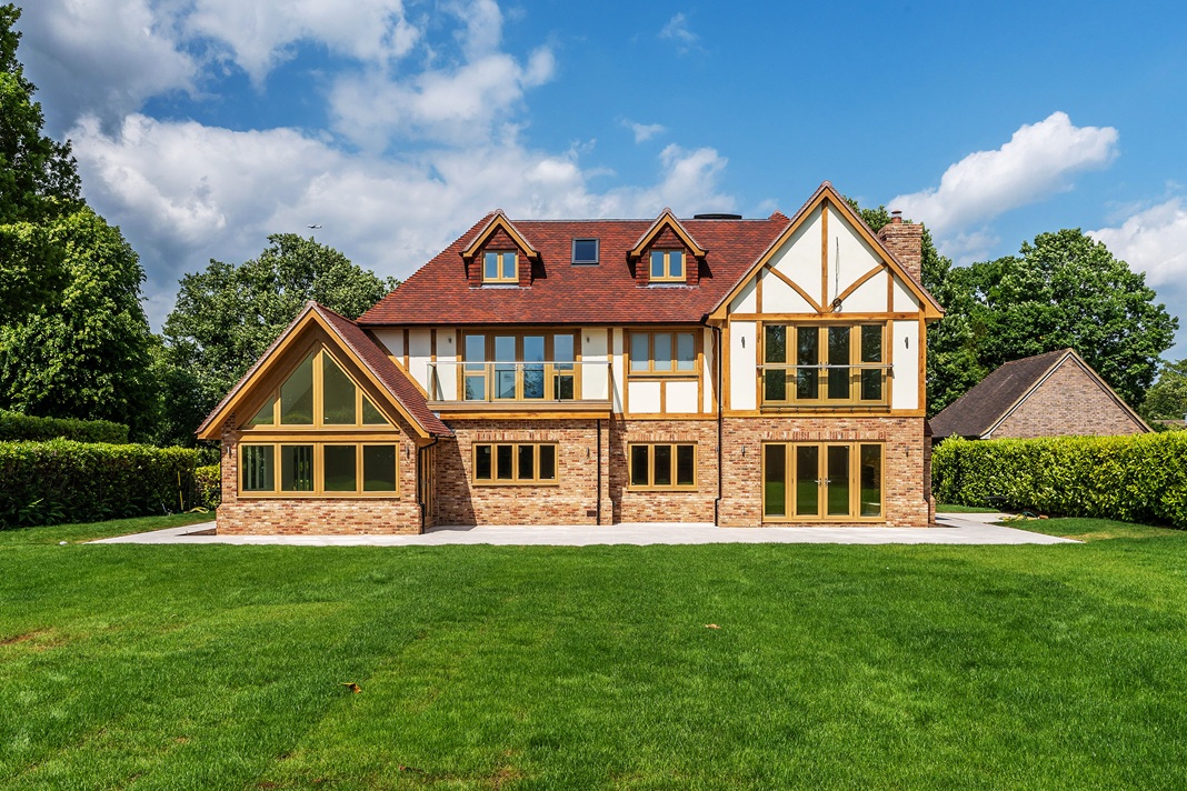 Contemporary Tudor-Style property built with Residence 9 windows ...