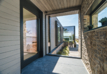Reynaers SlimLine 68 delivers premium coastal performance for estuary boathouse project