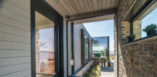 Reynaers SlimLine 68 delivers premium coastal performance for estuary boathouse project
