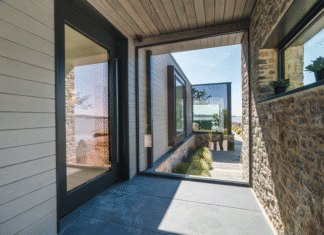 Reynaers SlimLine 68 delivers premium coastal performance for estuary boathouse project